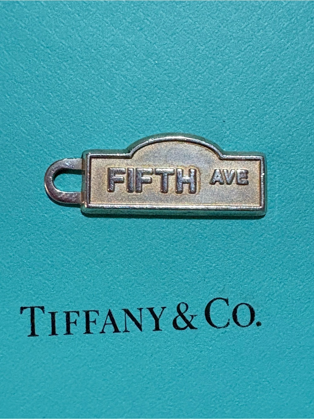 Tiffany & Co. Silver 'FIFTH AVE' Tag Charm with Blue Accent
